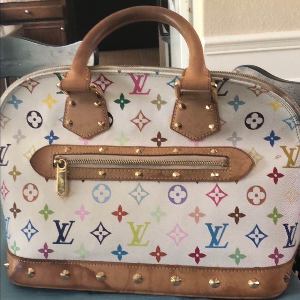 Authentic Louis Vuitton Alma white monogram bag